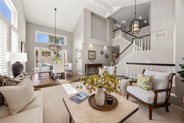 5005 Stonehaven Dr, Yorba Linda, CA 92887 - living room featuring an inviting chandelier, visible vents, high vaulted ceiling, and baseboards