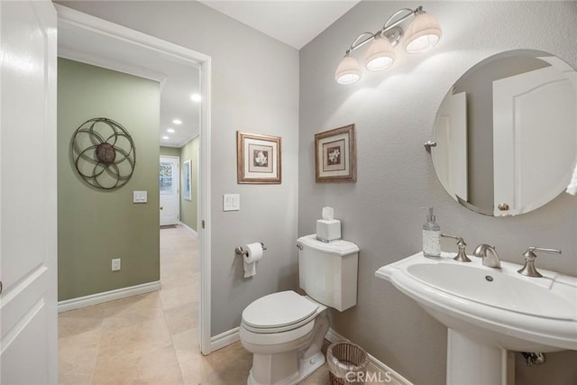 5005 Stonehaven Dr, Yorba Linda, CA 92887 - half bathroom with toilet, baseboards, tile patterned flooring, and a sink