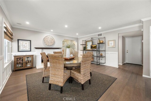 5005 Stonehaven Dr, Yorba Linda, CA 92887 - dining area featuring crown molding, recessed lighting, a wainscoted wall, and wood finished floors
