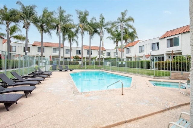 13461 Whittier Ln, Garden Grove, CA 92844 - pool featuring a patio, fence, and a residential view