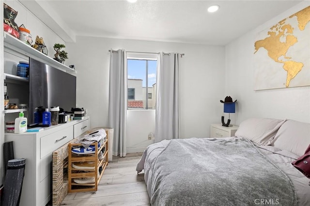 13461 Whittier Ln, Garden Grove, CA 92844 - bedroom featuring recessed lighting and light wood-style flooring