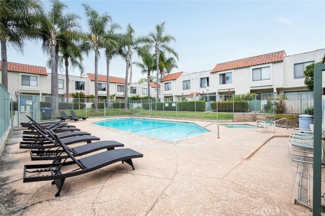 13461 Whittier Ln, Garden Grove, CA 92844 - pool with a patio area, fence, and a residential view