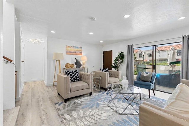 13461 Whittier Ln, Garden Grove, CA 92844 - living room with recessed lighting, light wood finished floors, and baseboards