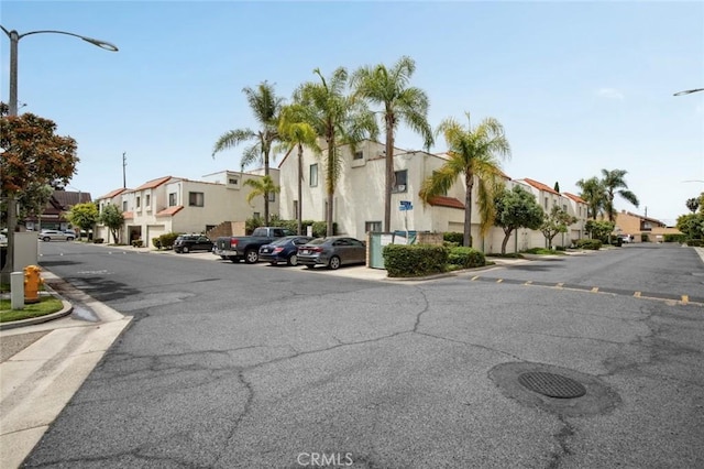 13461 Whittier Ln, Garden Grove, CA 92844 - view of street with street lighting, a residential view, and curbs