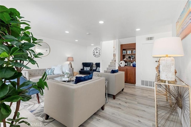 13461 Whittier Ln, Garden Grove, CA 92844 - living area with recessed lighting, stairs, light wood-style flooring, and visible vents