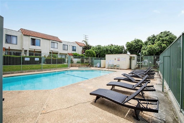 13461 Whittier Ln, Garden Grove, CA 92844 - community pool with a patio, fence, and a residential view