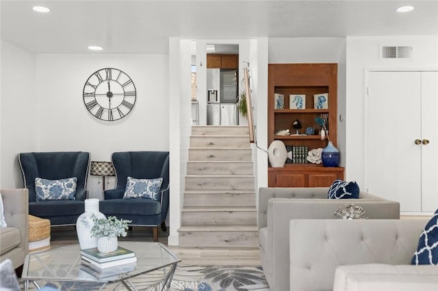 13461 Whittier Ln, Garden Grove, CA 92844 - living room with recessed lighting, visible vents, wood finished floors, and stairway