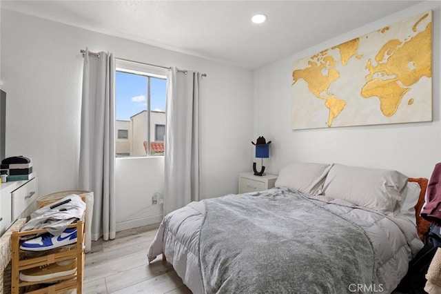 13461 Whittier Ln, Garden Grove, CA 92844 - bedroom with light wood-style floors and recessed lighting