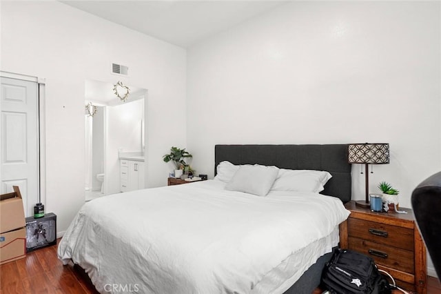 13461 Whittier Ln, Garden Grove, CA 92844 - bedroom with visible vents, ensuite bath, and wood finished floors