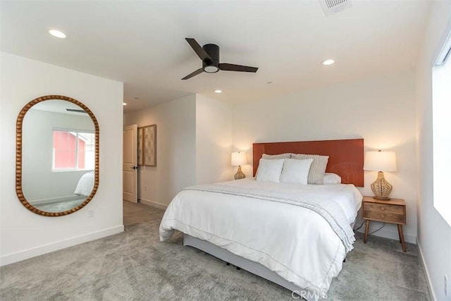 carpeted bedroom with visible vents, recessed lighting, a ceiling fan, and baseboards