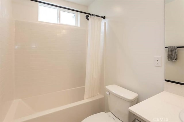 full bath featuring shower / bathtub combination with curtain, vanity, and toilet