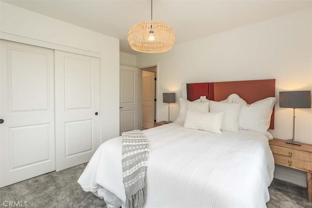 bedroom with a closet and carpet