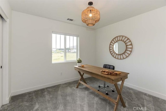 office space featuring visible vents, carpet floors, and baseboards