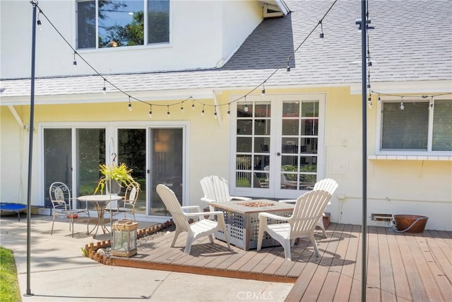 2871 N Wyngate Rd, Orange, CA 92867 - wooden deck with french doors and an outdoor fire pit