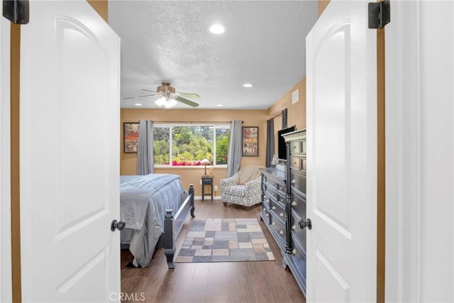 2871 N Wyngate Rd, Orange, CA 92867 - bedroom featuring dark wood-type flooring, recessed lighting, a textured ceiling, and ceiling fan