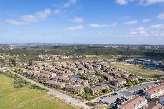 birds eye view of property with a residential view