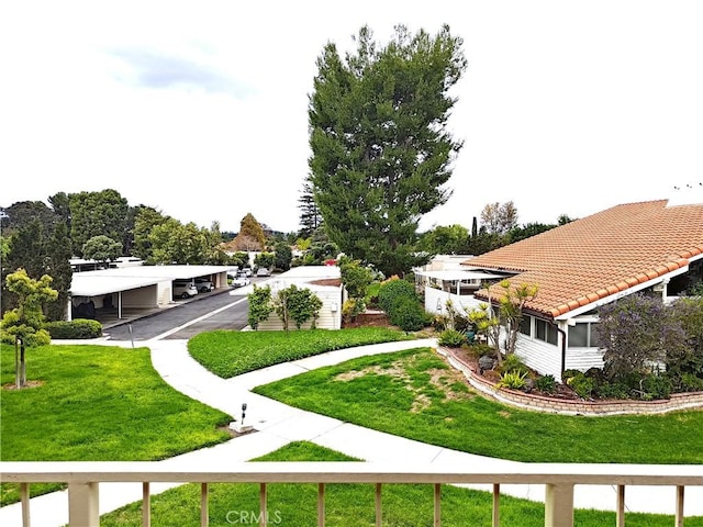 view of community featuring a yard