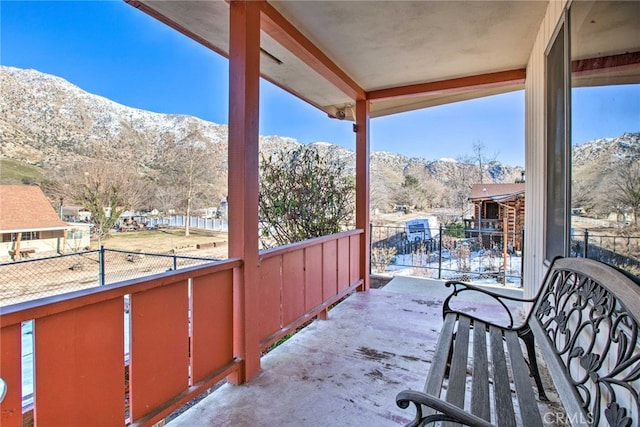 balcony featuring a mountain view