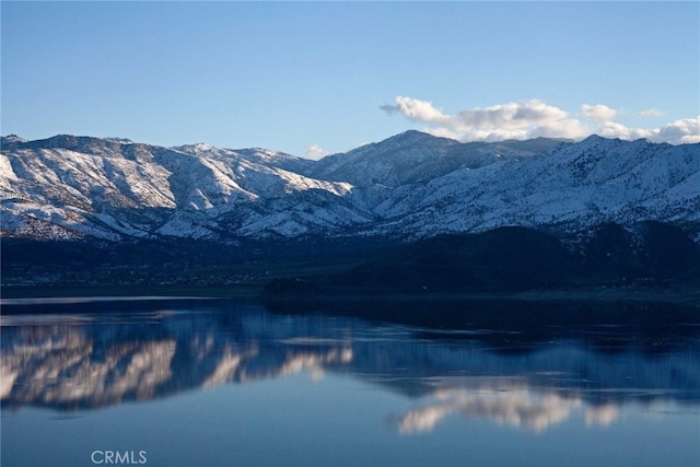 view of mountain feature featuring a water view