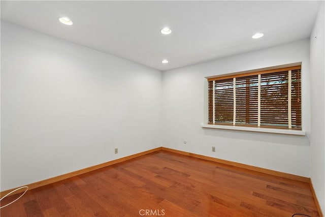 2018 Palisades Dr, Fullerton, CA 92831 - spare room with baseboards, recessed lighting, and wood finished floors
