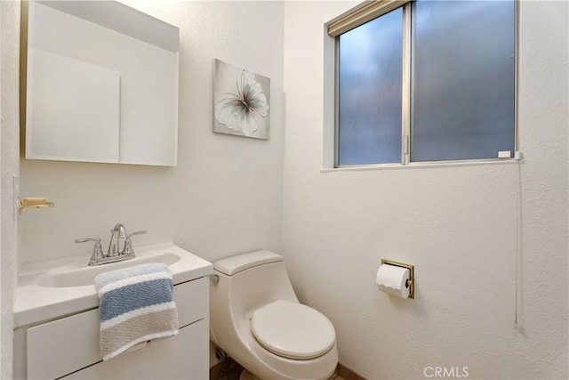 2018 Palisades Dr, Fullerton, CA 92831 - half bathroom featuring toilet and a sink