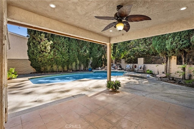 2018 Palisades Dr, Fullerton, CA 92831 - view of pool featuring a fenced in pool, ceiling fan, a patio area, and a fenced backyard