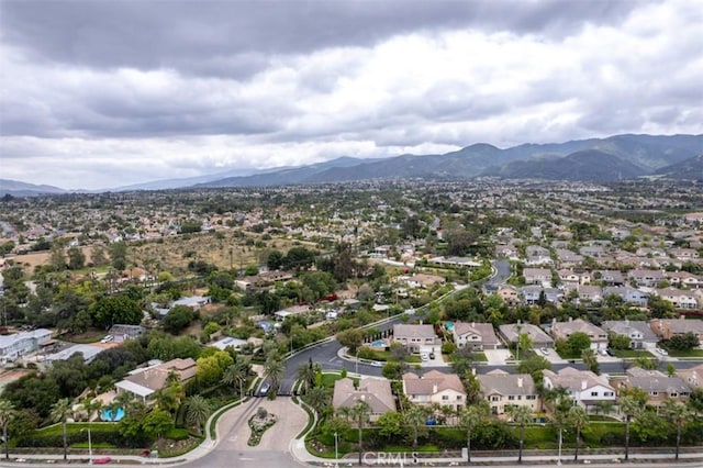 birds eye view of property featuring a residential view and a mountain view