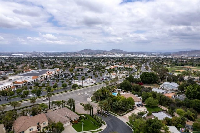 drone / aerial view featuring a mountain view