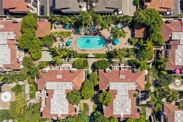 4752 Tiara Dr Unit 103, Huntington Beach, CA 92649 - aerial view of property and surrounding area featuring a pool area and nearby suburban area