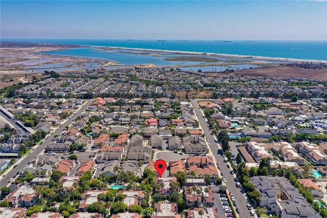 4752 Tiara Dr Unit 103, Huntington Beach, CA 92649 - aerial view of property and surrounding area with nearby suburban area and a large body of water