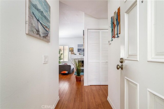 4752 Tiara Dr Unit 103, Huntington Beach, CA 92649 - hall featuring baseboards and wood finished floors