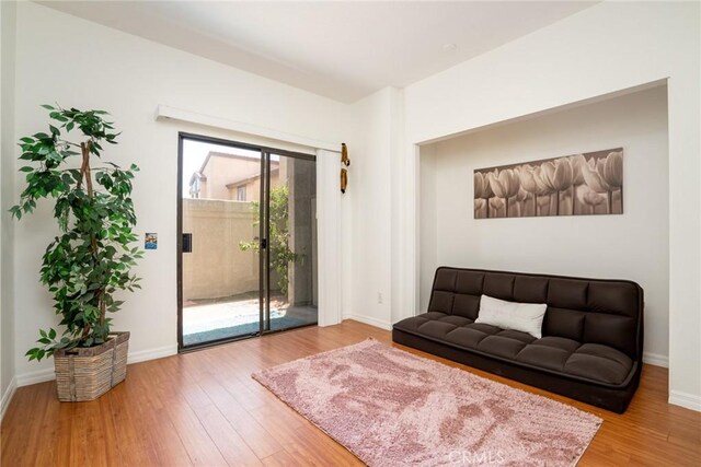 4752 Tiara Dr Unit 103, Huntington Beach, CA 92649 - living area featuring wood finished floors and baseboards