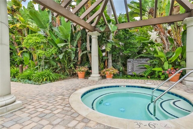 4752 Tiara Dr Unit 103, Huntington Beach, CA 92649 - view of pool featuring a community hot tub