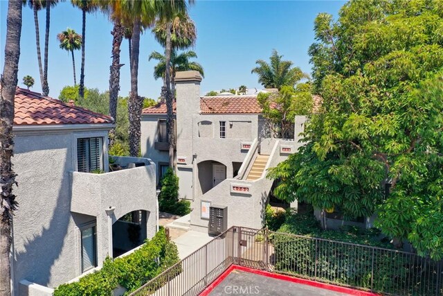 4752 Tiara Dr Unit 103, Huntington Beach, CA 92649 - view of property with a residential view