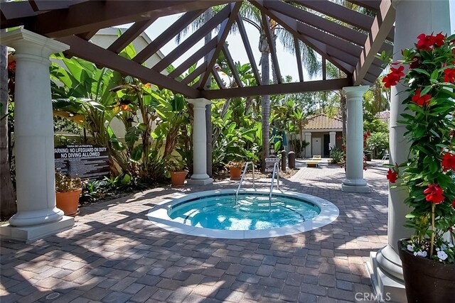 4752 Tiara Dr Unit 103, Huntington Beach, CA 92649 - view of pool featuring a hot tub and a gazebo