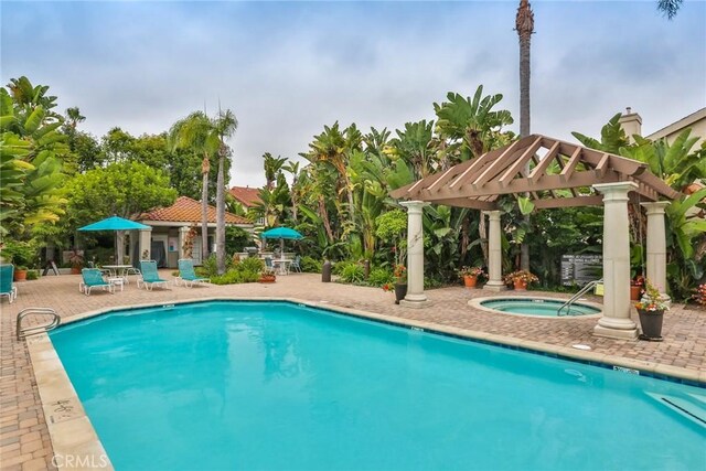 4752 Tiara Dr Unit 103, Huntington Beach, CA 92649 - community pool with a hot tub, a patio, and a pergola