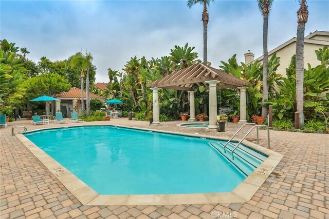 4752 Tiara Dr Unit 103, Huntington Beach, CA 92649 - community pool featuring a gazebo, a patio area, and a hot tub