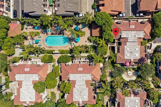 4752 Tiara Dr Unit 103, Huntington Beach, CA 92649 - aerial view of property and surrounding area featuring a pool area