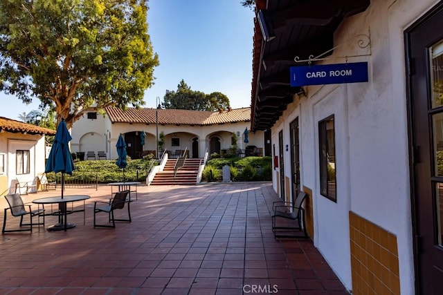 3243 San Amadeo Unit 2H, Laguna Woods, CA 92637 - view of patio / terrace with stairs