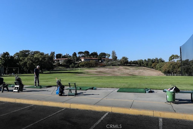 3243 San Amadeo Unit 2H, Laguna Woods, CA 92637 - view of property's community with a yard