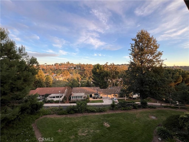 3243 San Amadeo Unit 2H, Laguna Woods, CA 92637 - view of yard with a forest view