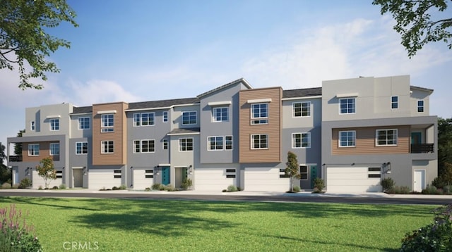 view of front of property with a front yard and stucco siding