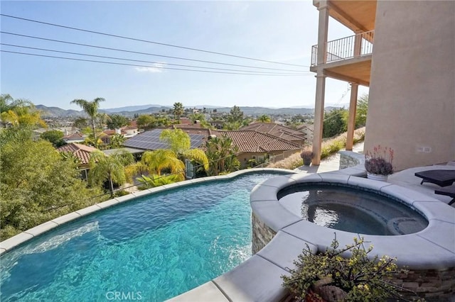 28846 Yosemite Pl, Canyon Lake, CA 92587 - view of swimming pool with a pool with connected hot tub and a mountain view