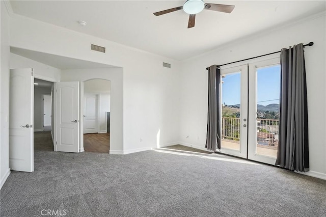 28846 Yosemite Pl, Canyon Lake, CA 92587 - unfurnished room with carpet, a ceiling fan, arched walkways, and french doors