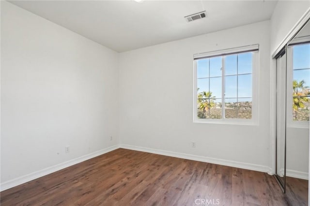 28846 Yosemite Pl, Canyon Lake, CA 92587 - empty room with baseboards and dark wood-style floors
