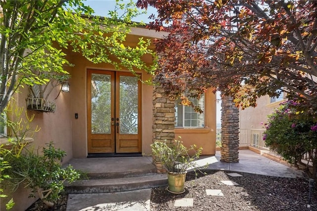 28846 Yosemite Pl, Canyon Lake, CA 92587 - property entrance with french doors and stucco siding