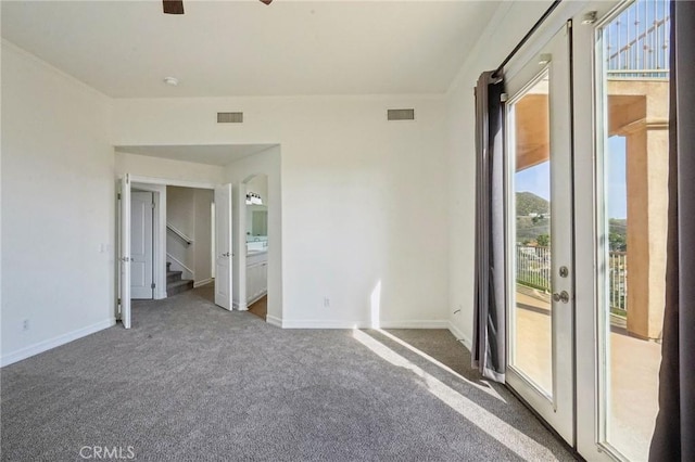28846 Yosemite Pl, Canyon Lake, CA 92587 - unfurnished bedroom featuring access to exterior, carpet floors, and ensuite bath