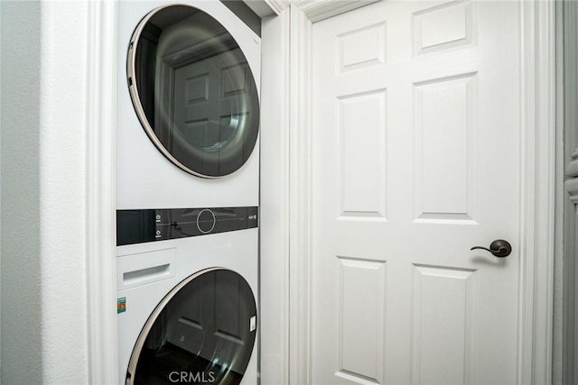 5935 Playa Vista Dr Unit 307, Playa Vista, CA 90094 - clothes washing area with stacked washer and dryer and laundry area