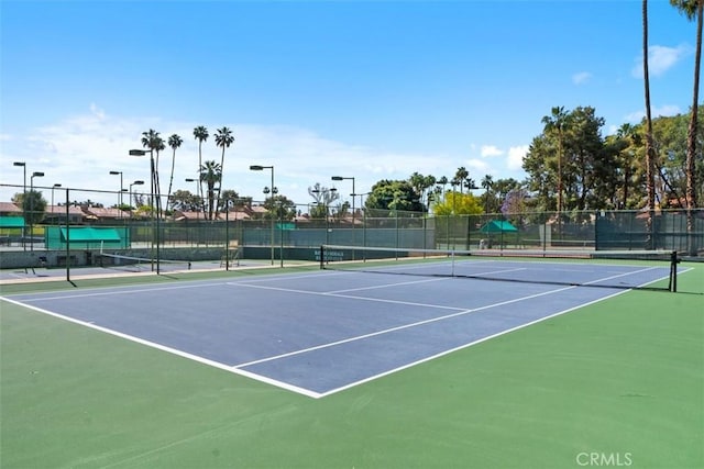 74 Tennis Club Dr, Rancho Mirage, CA 92270 - view of sport court featuring fence and community basketball court