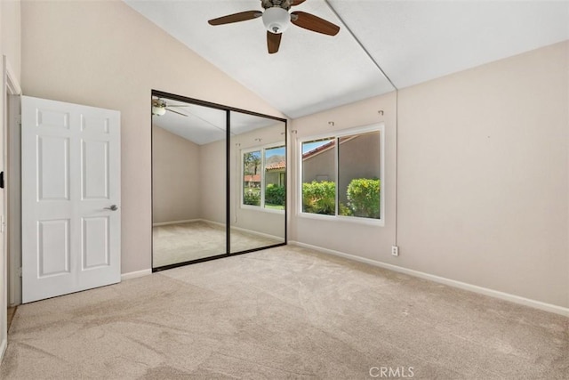 74 Tennis Club Dr, Rancho Mirage, CA 92270 - unfurnished bedroom with carpet floors, baseboards, and vaulted ceiling